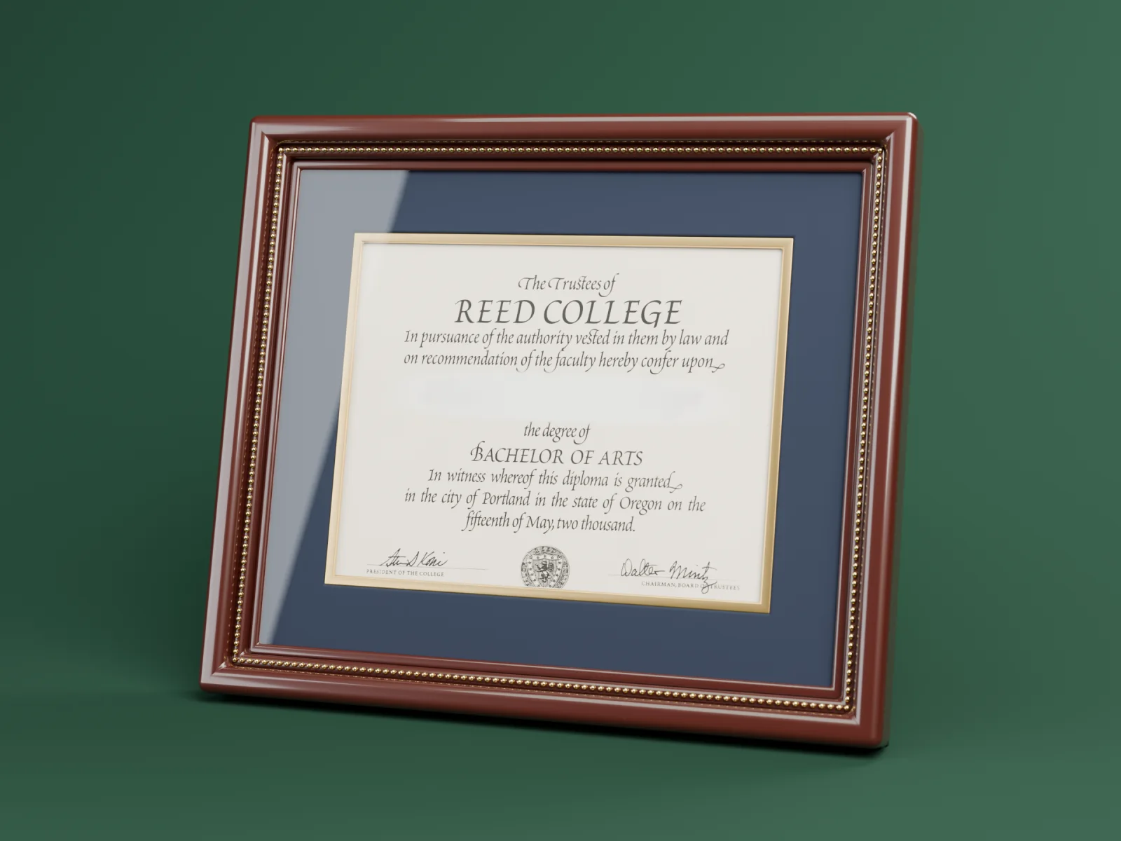 Reed College Bachelor of Arts diploma in a mahogany frame with a navy mat and gold fillet.